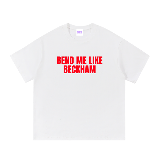 White t-shirt with red text 'Bend Me Like Beckham' on a white background