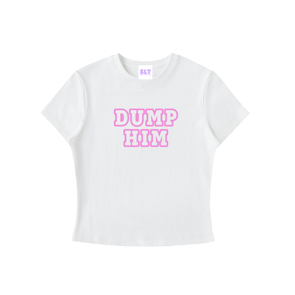 A white short-sleeve crop top t-shirt featuring the text 'DUMP HIM' printed on the chest in pink bubble letters with a white outline. The neck label shows the brand 'SLY'.
