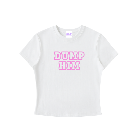 A white short-sleeve crop top t-shirt featuring the text 'DUMP HIM' printed on the chest in pink bubble letters with a white outline. The neck label shows the brand 'SLY'.