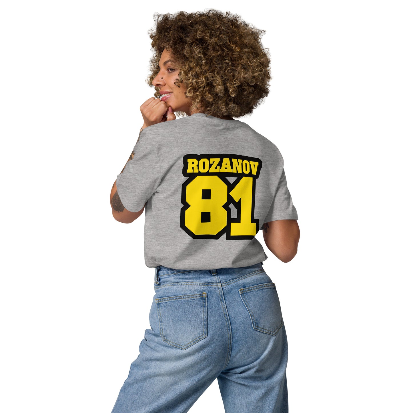 Person wearing a gray t-shirt with 'ROZANOV 81' printed on the back, standing against a white background.