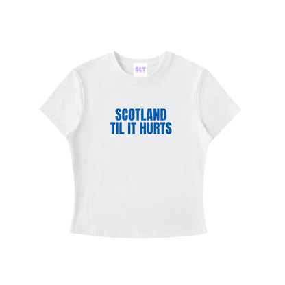 White t-shirt with blue text 'SCOTLAND TIL IT HURTS' on a white background