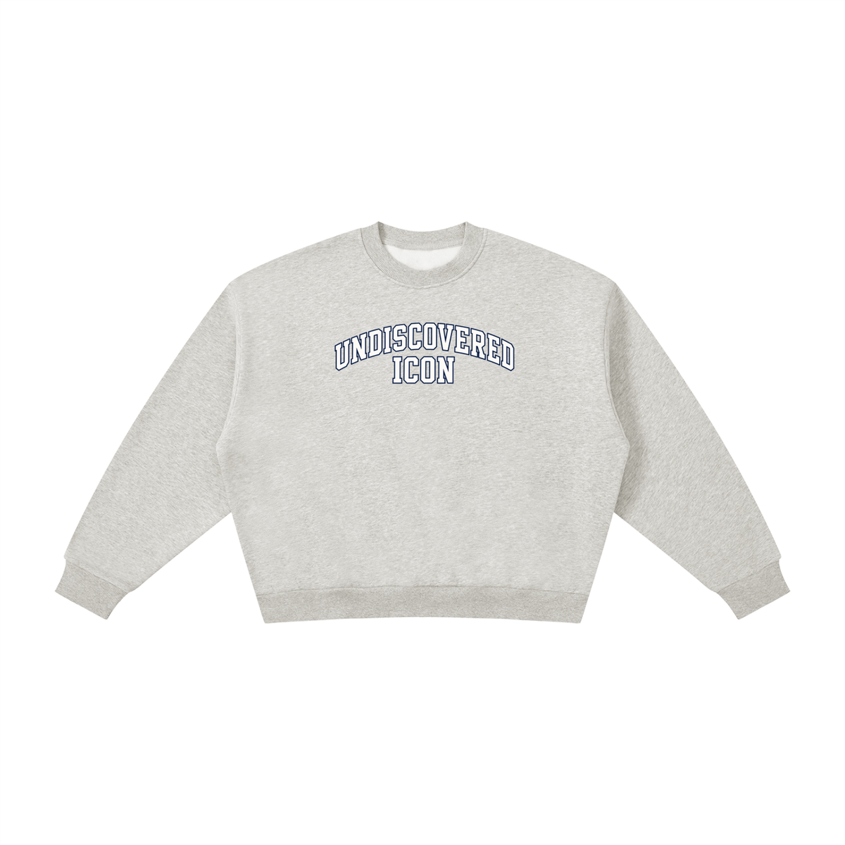 A light heather gray crewneck sweatshirt with 'UNDISCOVERED ICON' printed in an arched navy and white collegiate font on the chest, displayed on a clean white background.