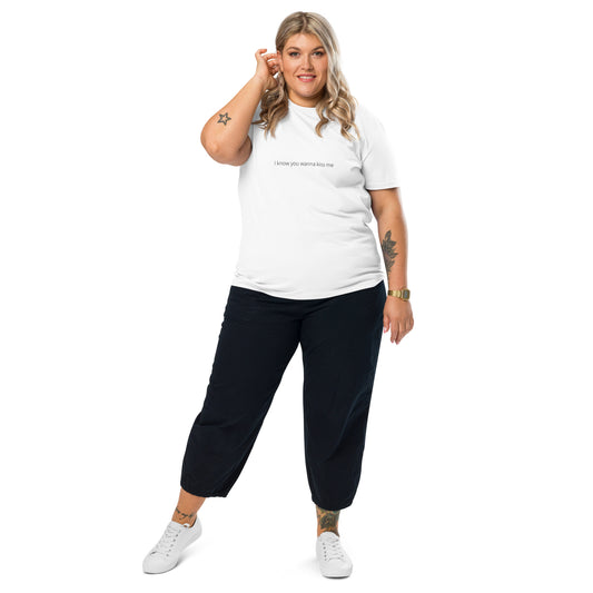 Woman wearing a white t-shirt and navy pants on a white background