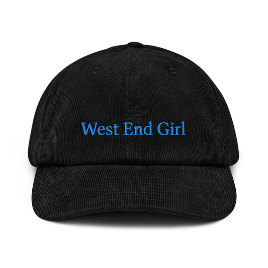Black cap with 'West End Girl' text in blue on a white background